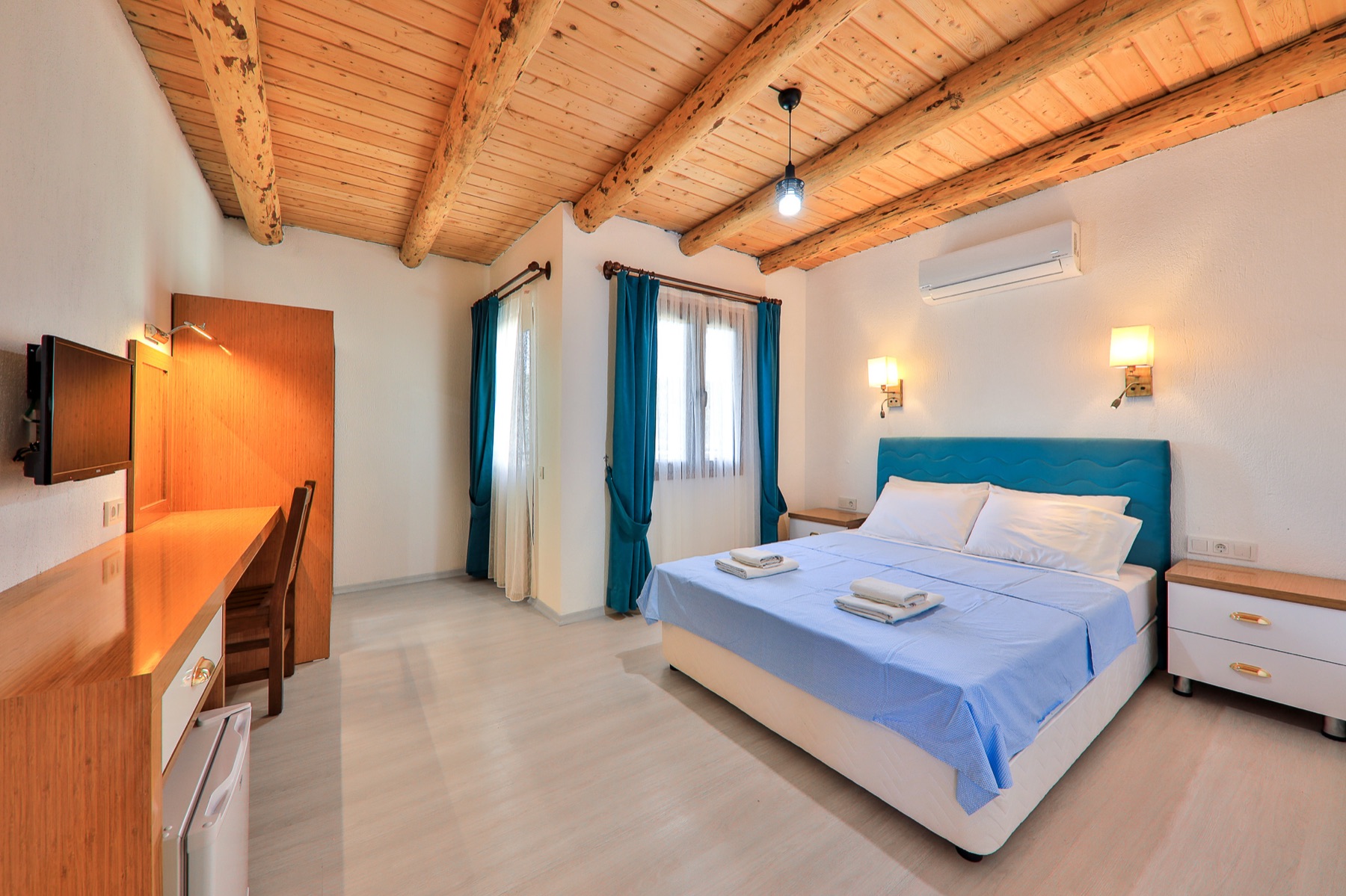 Bett- und Sitzbereich im Superior-Doppelzimmer